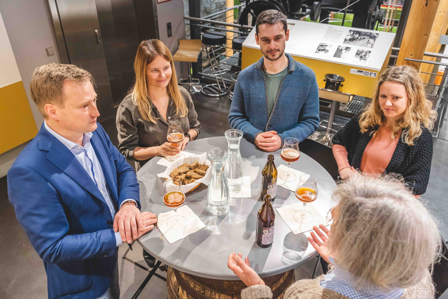 Visitors at a beer tasting in the German Hop Museum