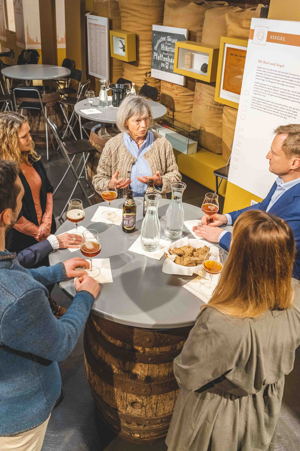 Visitors at a beer tasting in the German Hop Museum